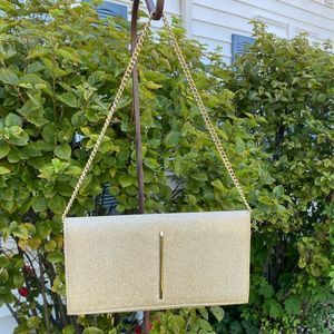 Elegant Gold Clutch with Chain Strap